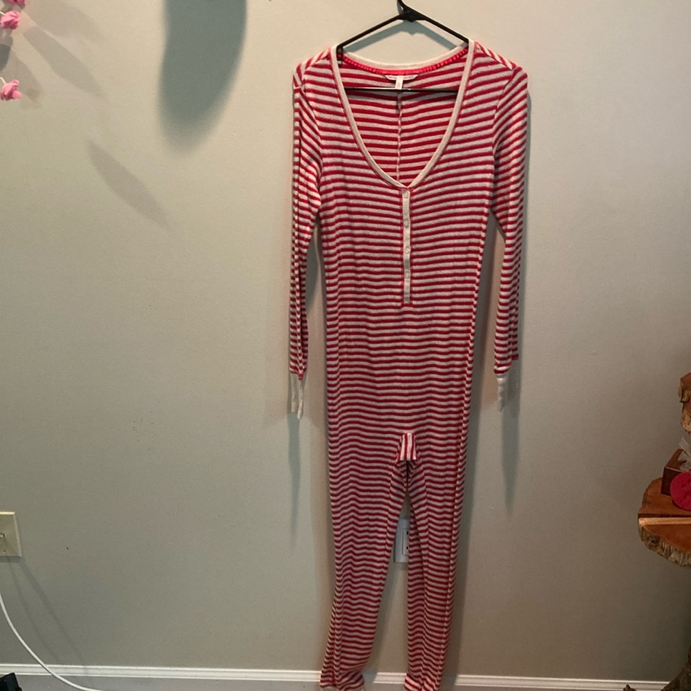 Victoria’s Secret, red and cream colored w/ silver outline Christmas pajamas.